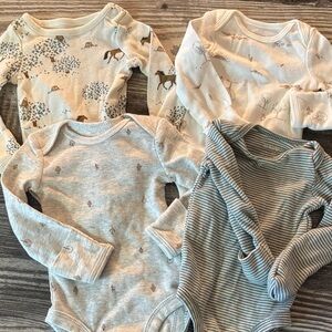 4 Carter’s Longsleeved Newborn Onesies